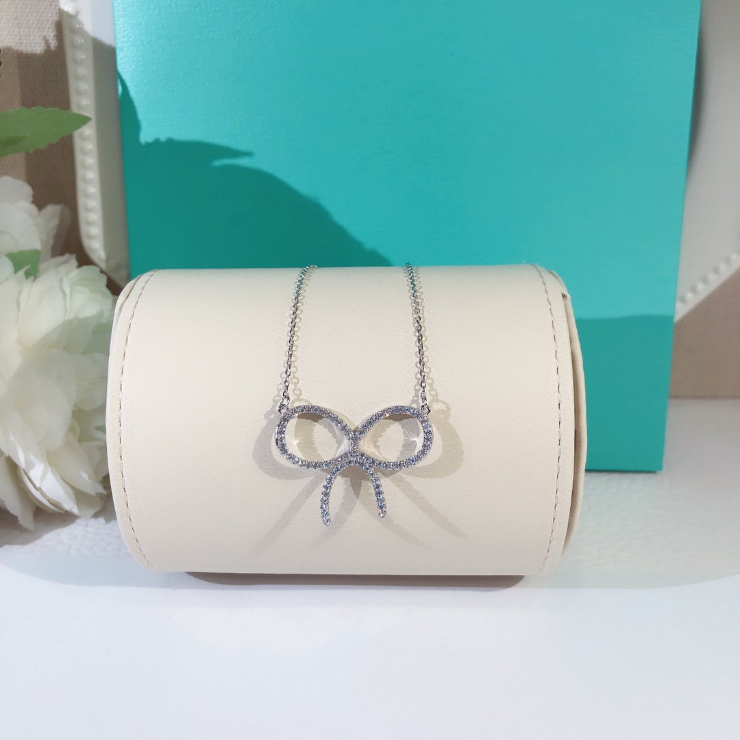 [Stellar jewels]CLAW SET RHODIUM PLATED BOW NECKLACE
