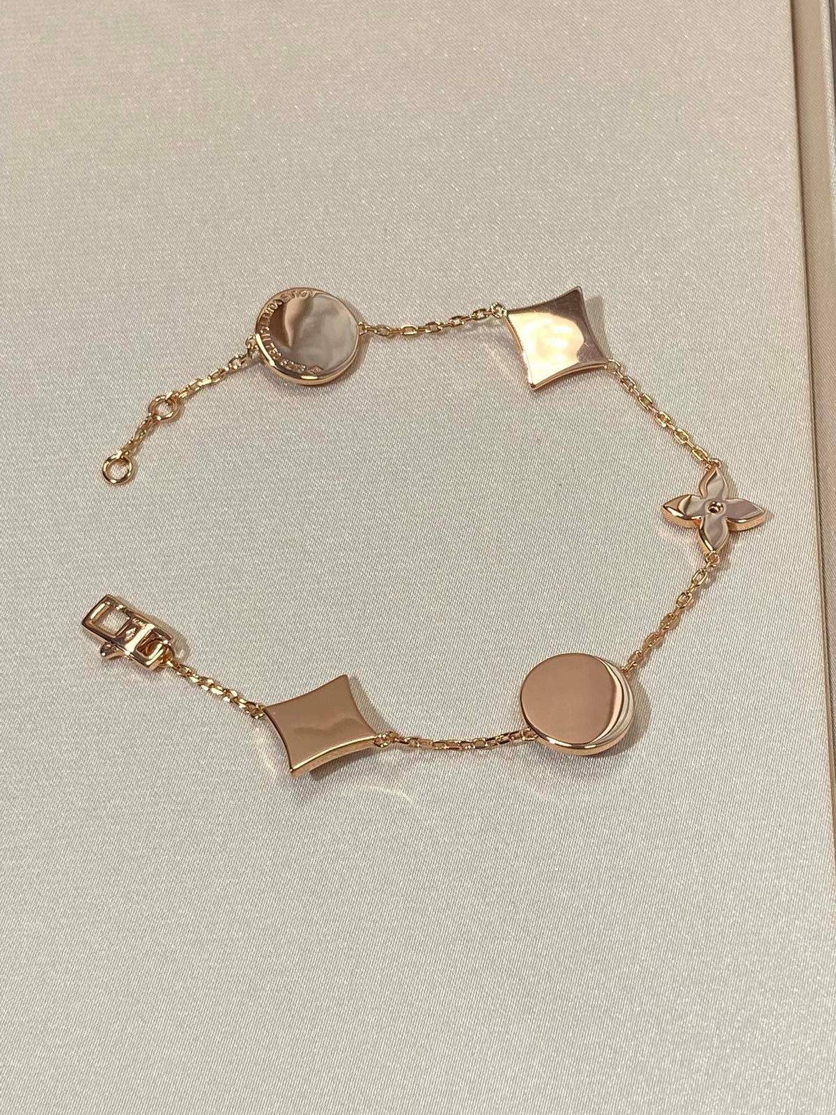 [Stellar Jewelry]STAR AND SUN 5 MOTIF MOP PINK GOLD BRACELET